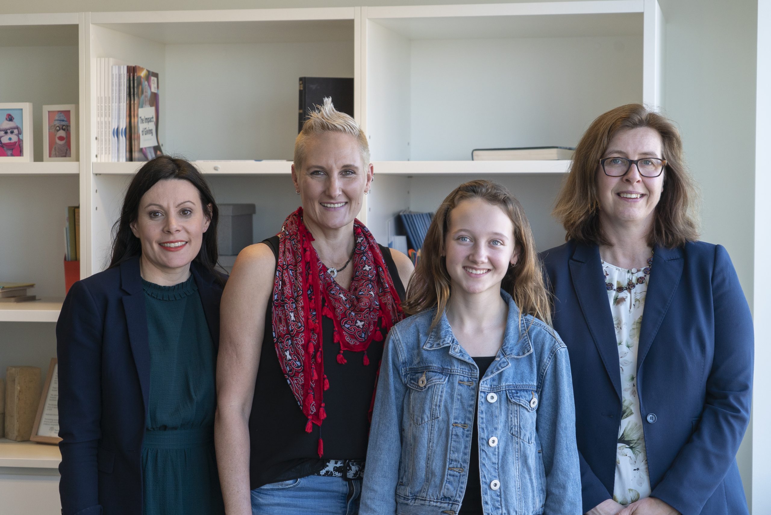 Participant Sian with Mum Azelene (centre), and study investigators Prof Angela Morgan (left) and Prof Melanie Bahlo (right).